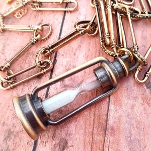 Hour Glass Pendant on GLD chain Necklace